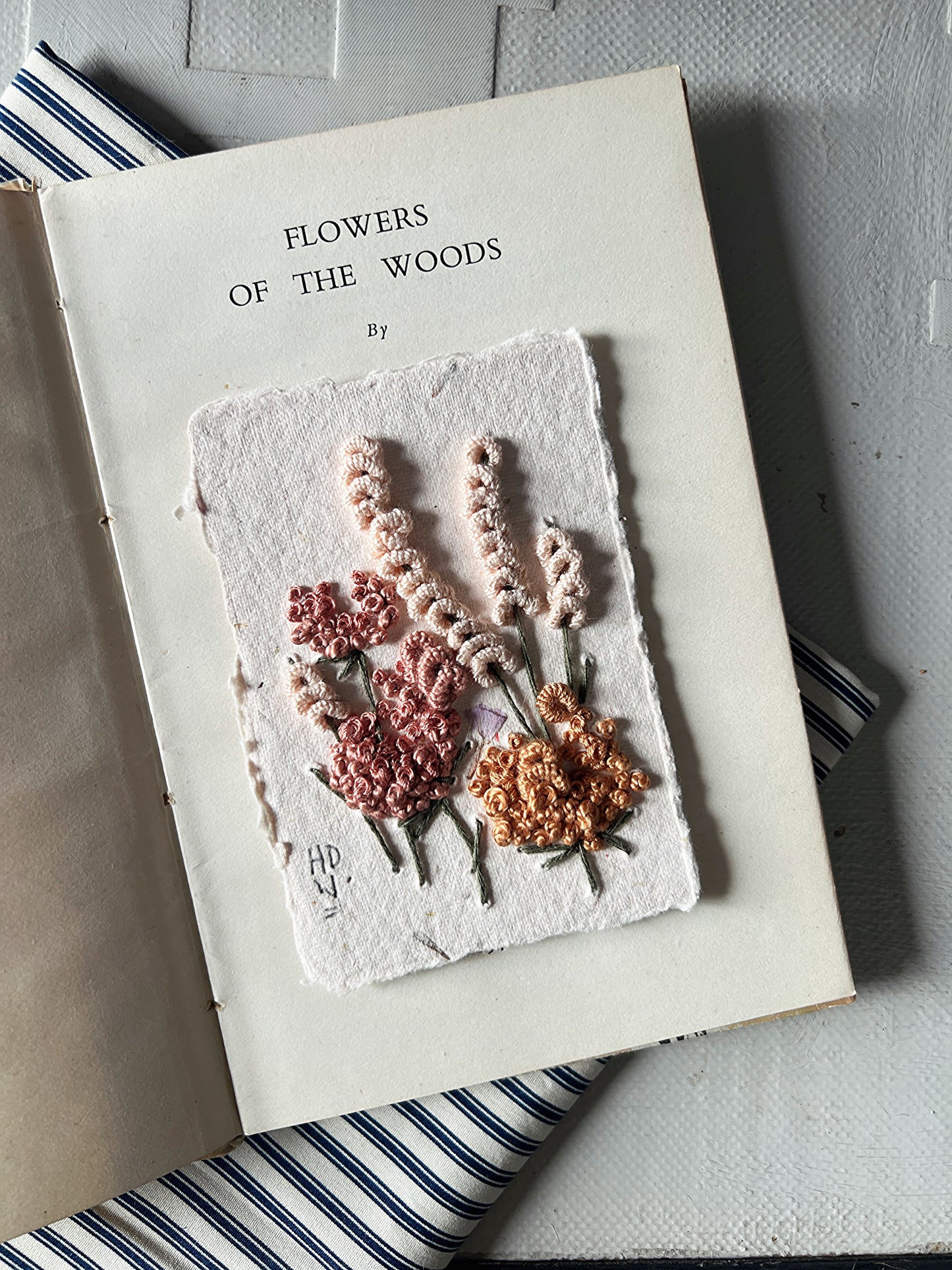 014- Embroidered wild flowers on Handmade Paper