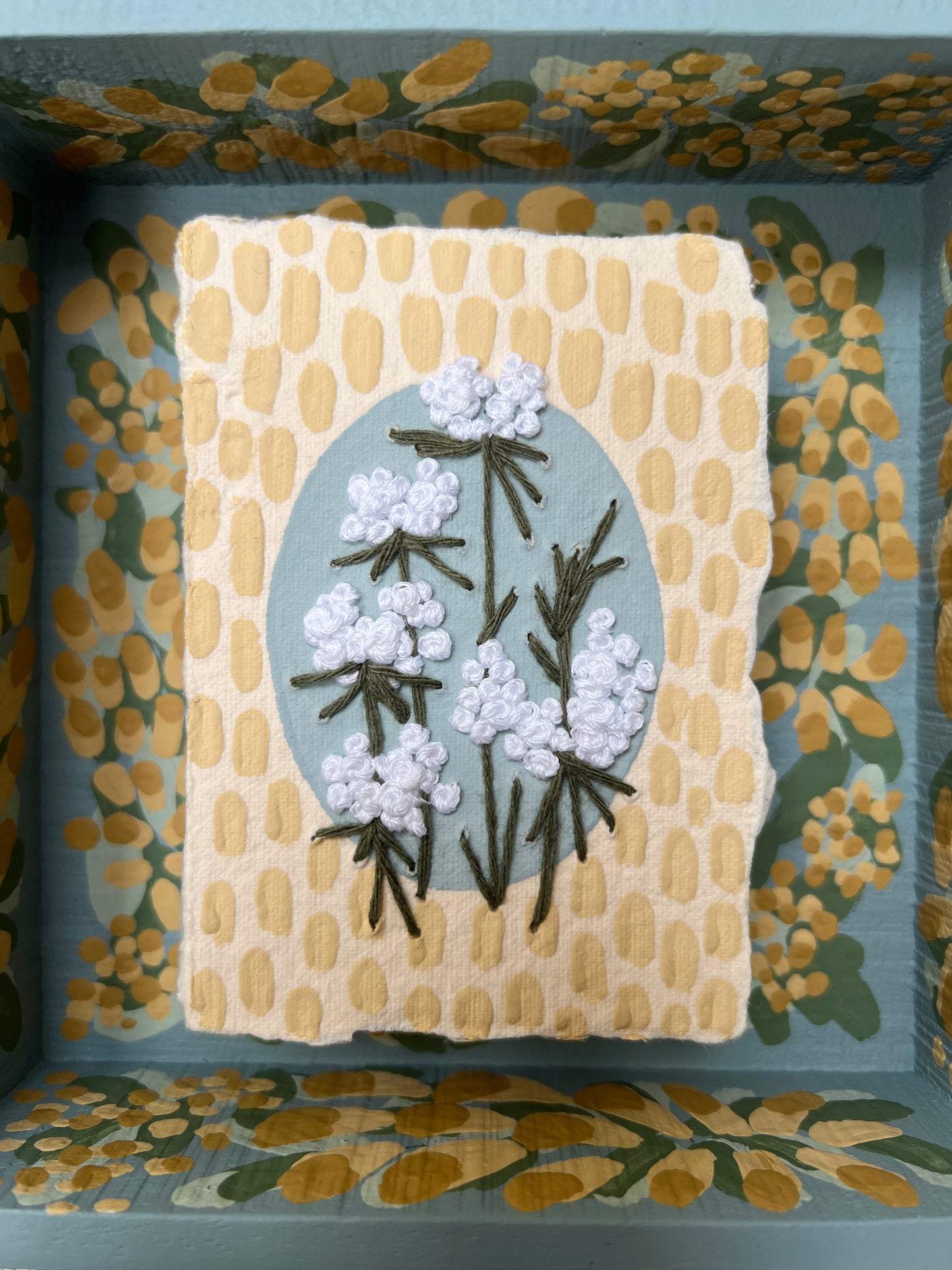 005 - Embroidered wild flowers on Handmade Paper - Framed in Yellow & Blue