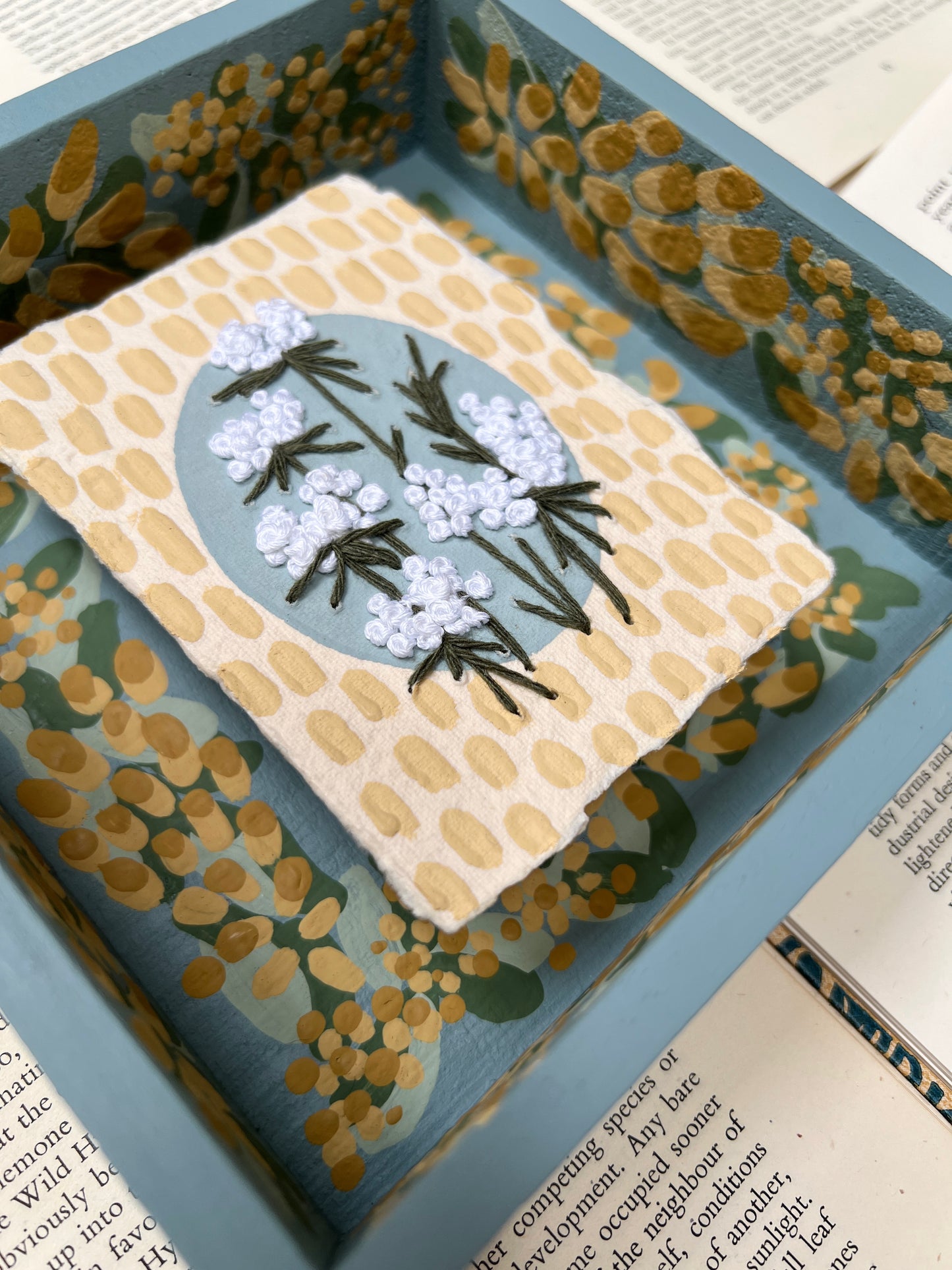 005 - Embroidered wild flowers on Handmade Paper - Framed in Yellow & Blue
