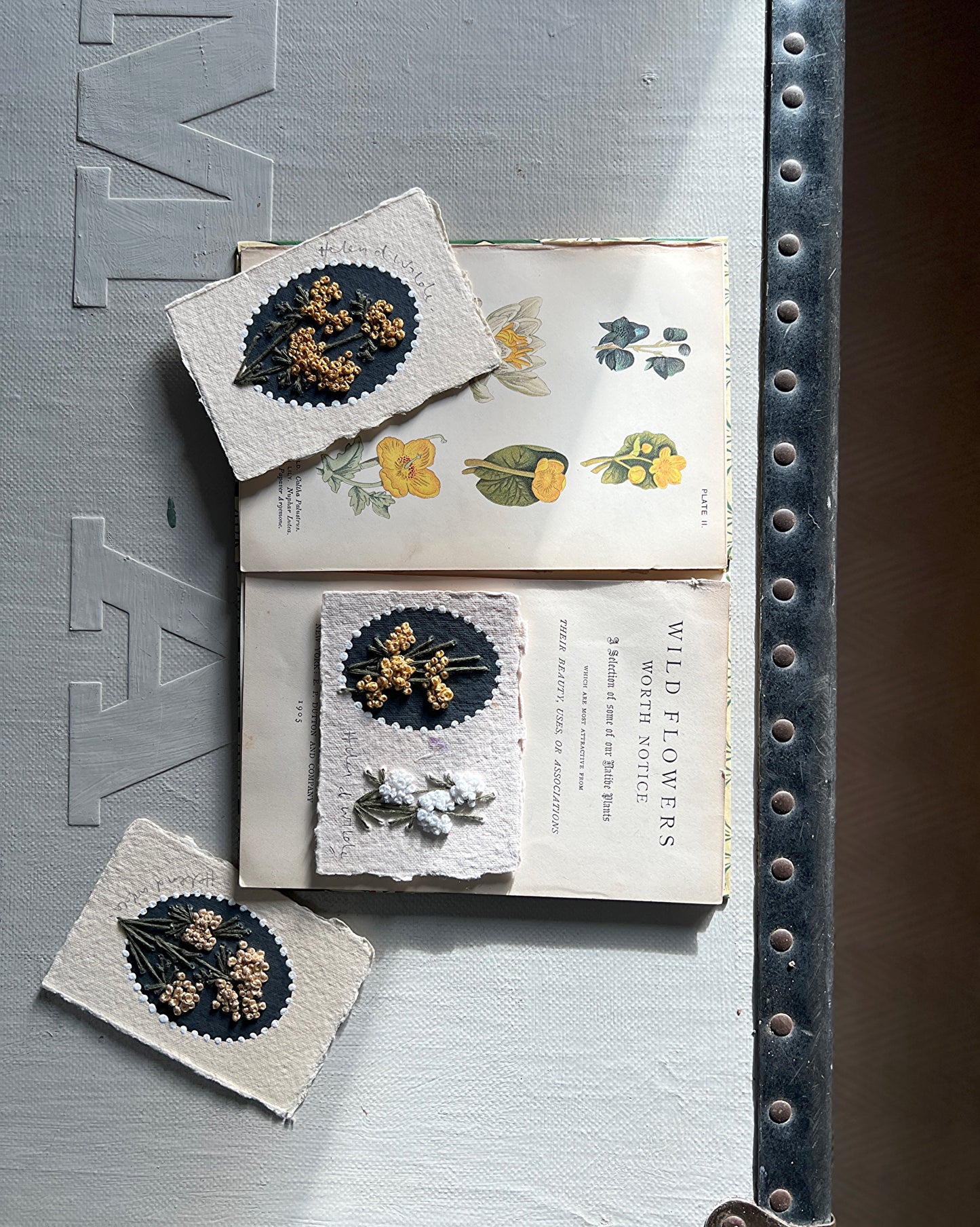 013 - Embroidered florals on Handmade wildflower Paper