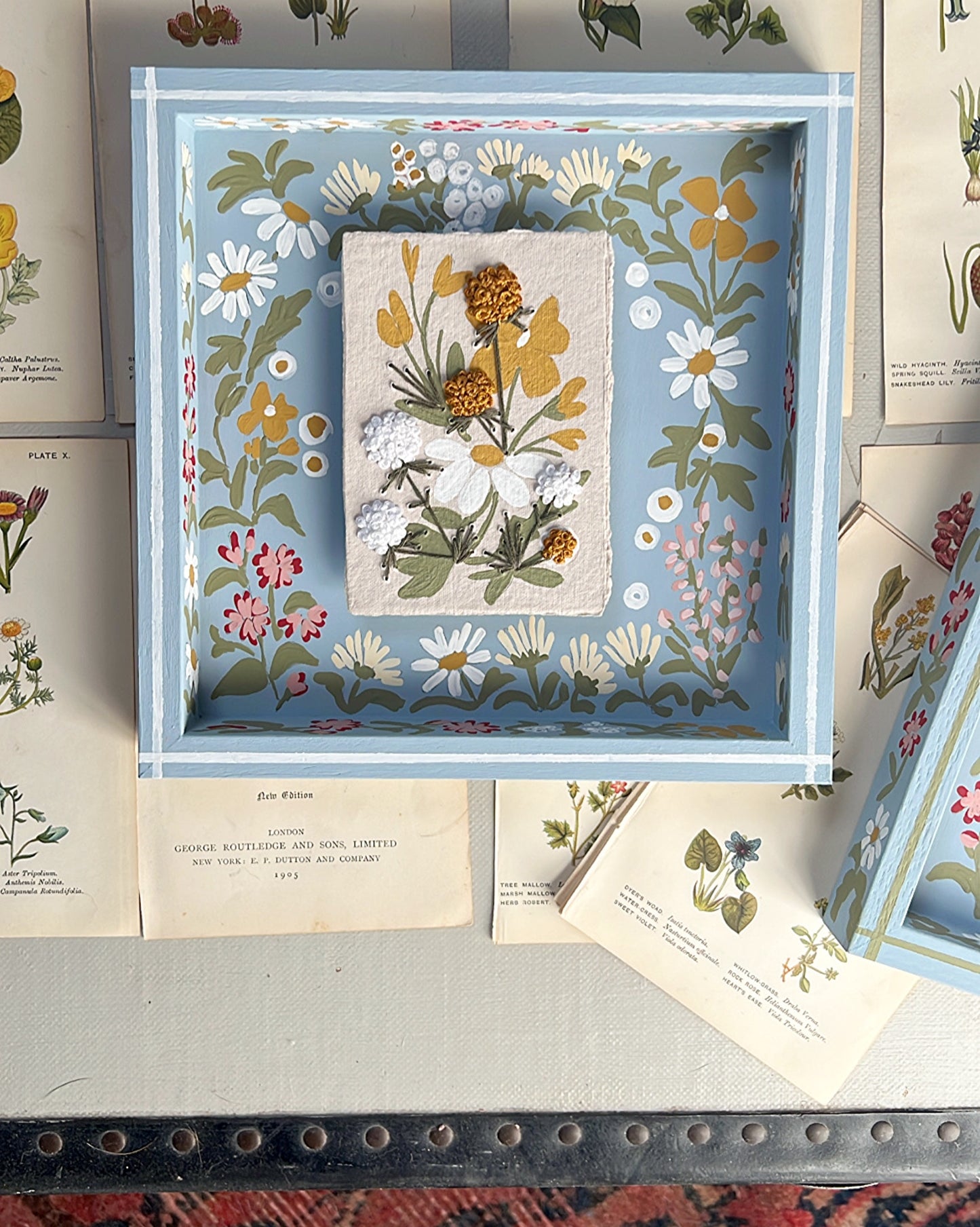 007 - Embroidered wild flowers on Handmade Paper with painted Frame.