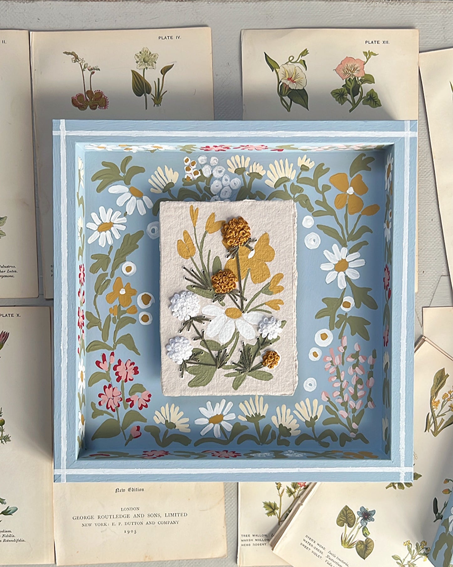 007 - Embroidered wild flowers on Handmade Paper with painted Frame.