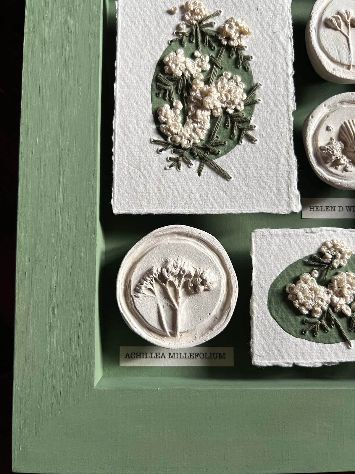 002 Framed plaster Intaglios & paper embroidery - in Calke Green